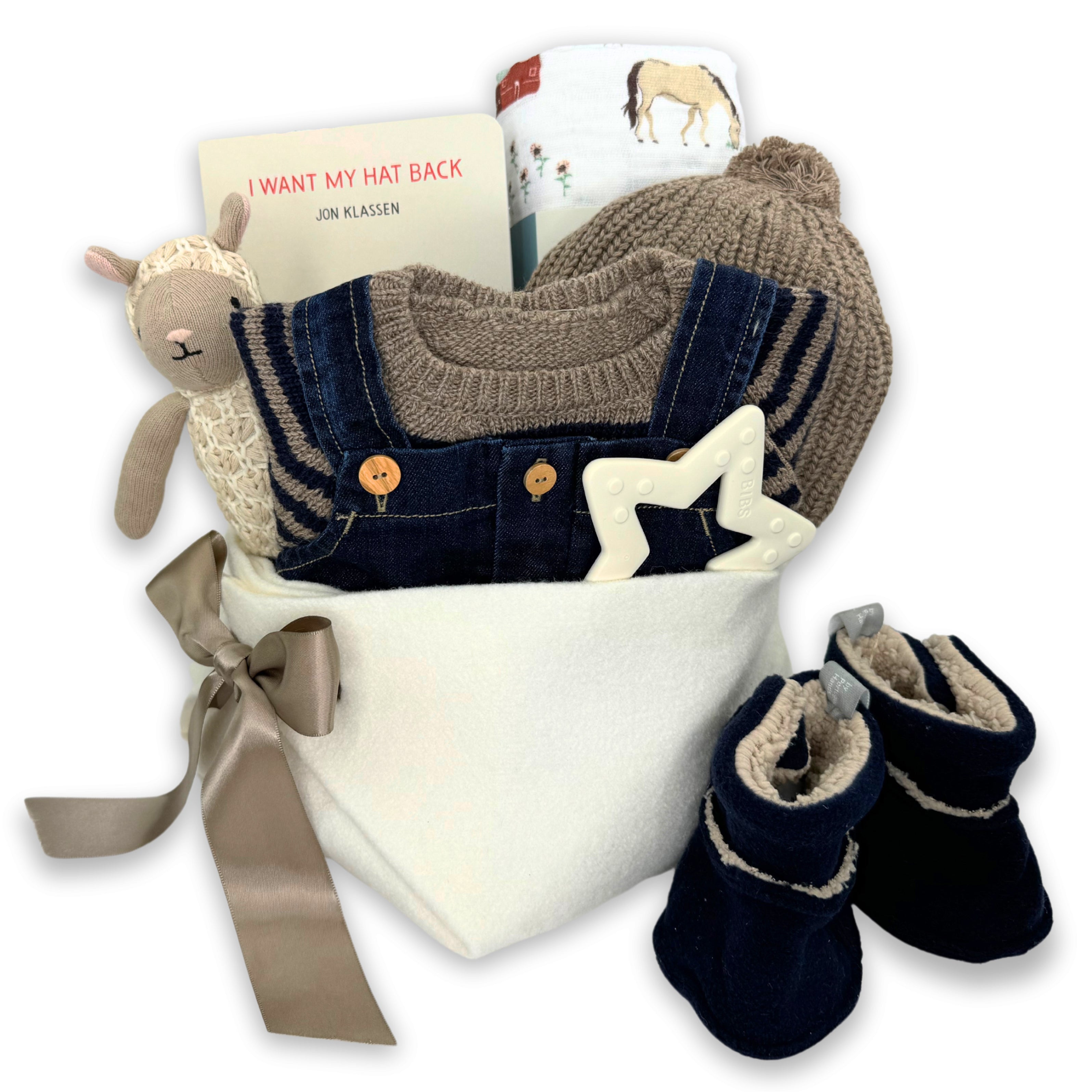 Luxury Neutral Baby Gift Basket featuring designer from Portugal Snug with adorable gifts curated by Bonjour Baby Baskets