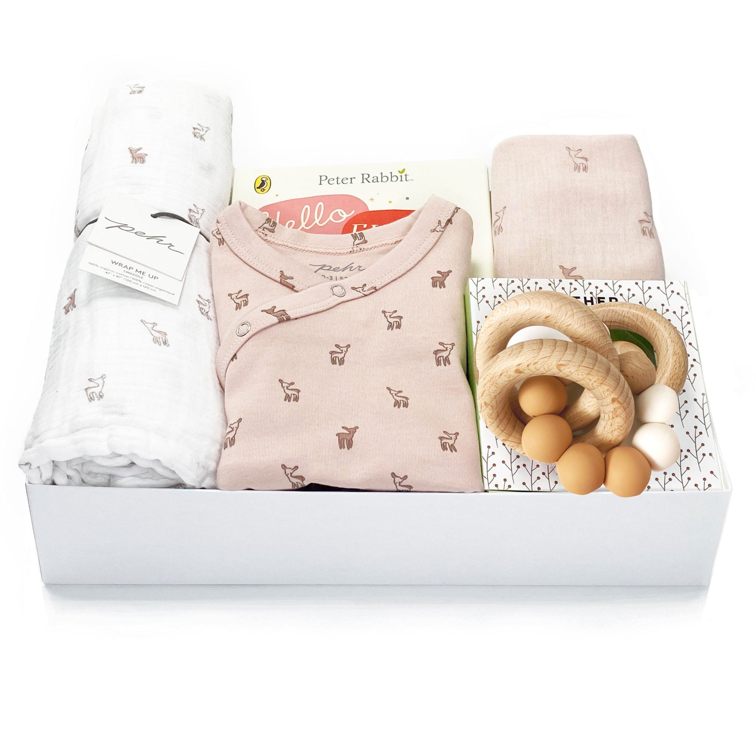 Baby Girl Gift Box featuring a Romper, a bib and a blanket by Pehr, together with a teether and a book at Bonjour Baby Baskets