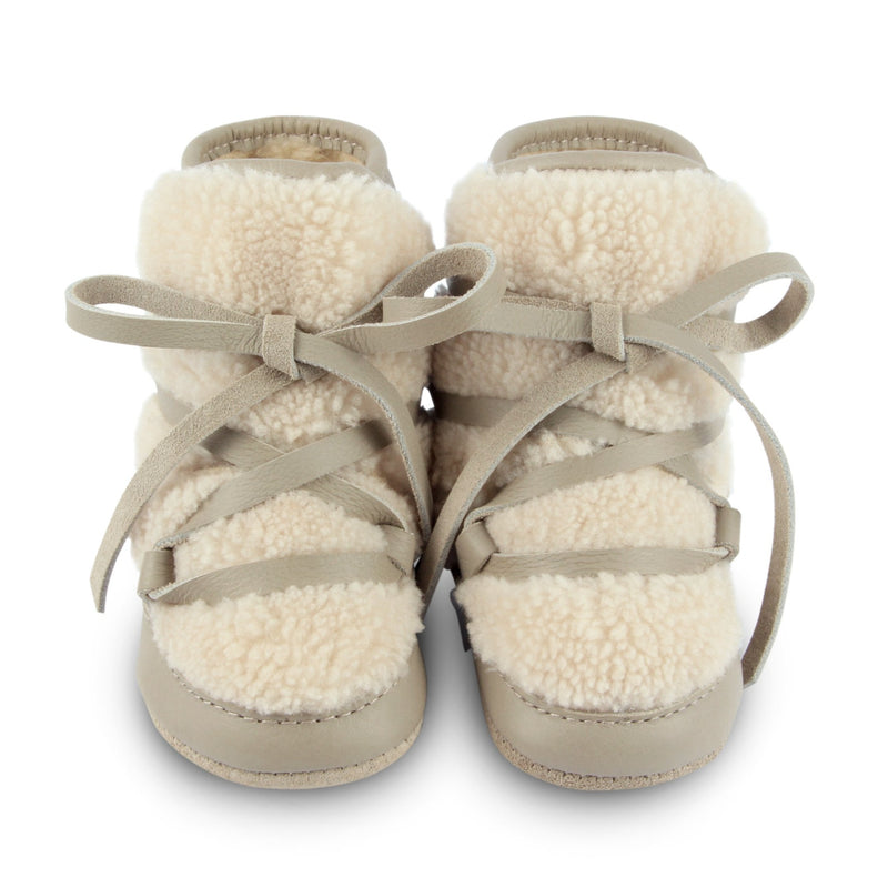 Leather baby boots lined with faux fur by Donsje Amsterdam at Bonjour Baby Baskets