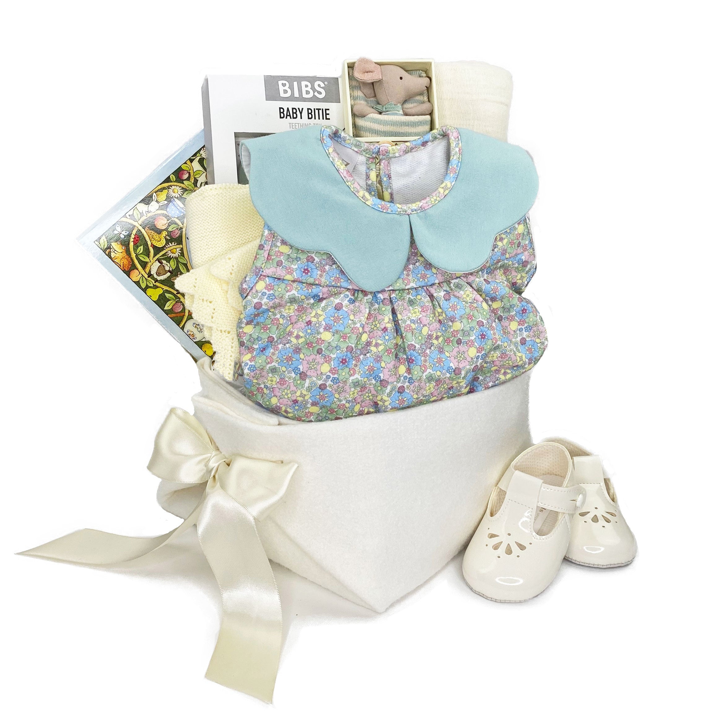 Luxury Baby Girl Gift Basket featuring Paz Rodriguez summer romper with scalloped collar and Liberty of London print with a sweet knitted bolero sweater and  patent shoes by Early Days. 