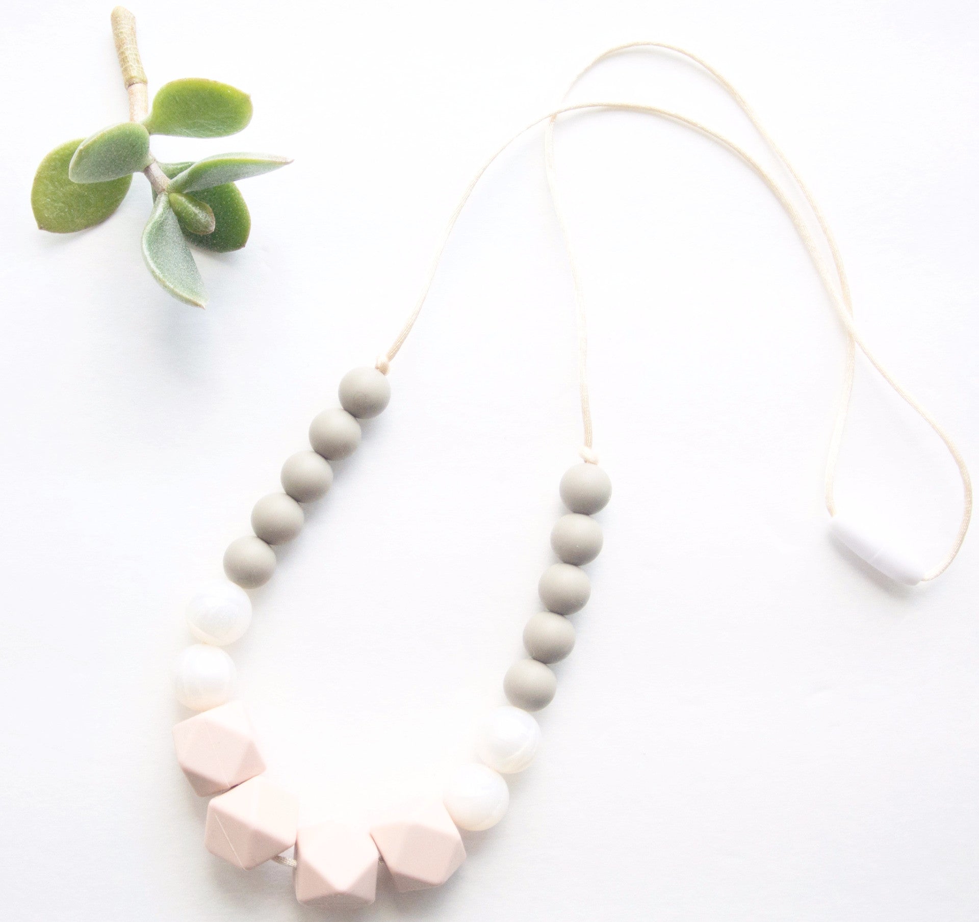 Silicone Teether Necklace perfect for teething babies and beautiful for moms to wear 